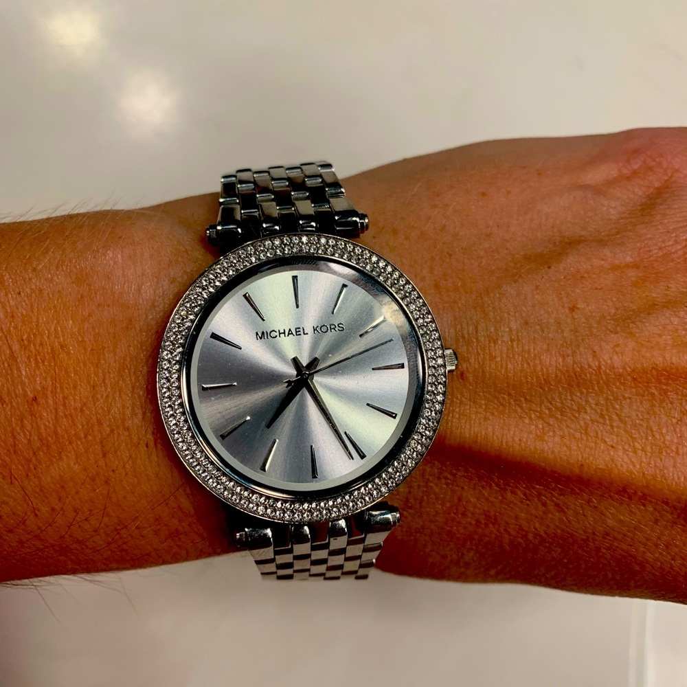 MK stainless steel watch.